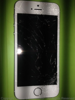 Shattered screen of iPhone 5S taken with the 4S
