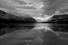Clouds resting on Bowman Lake in Glacier National Park, Montana